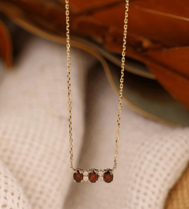 petite garnet pendant with diamonds